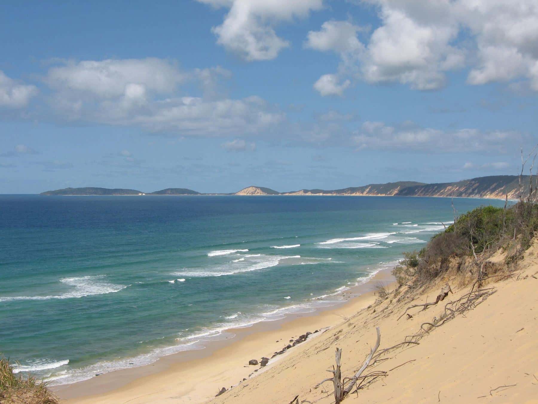 Coloured sand cliffs and Carlo Sandblow looking towards Double Island Point